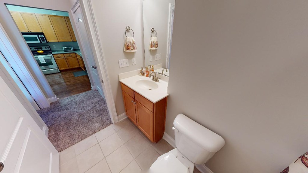 3811 Lunceston Way, Unit 105 Raleigh, NC 27613 - Photo 26 of 49 Guest Bath With Single Vanity