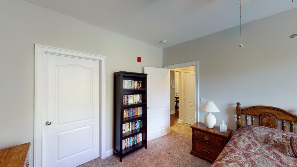 3811 Lunceston Way, Unit 105 Raleigh, NC 27613 - Photo 30 of 49 Guest Bedroom With Walk-in Closet