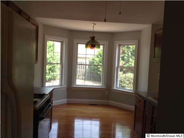 121 Castaway Road Manahawkin, NJ 08050 - Photo 3 of 3 a view of an empty room with a window