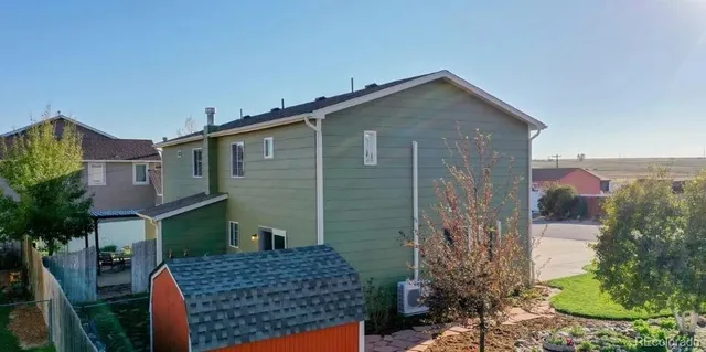 an aerial view of houses and roads