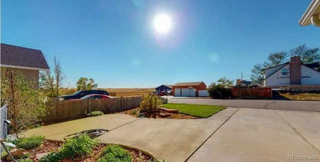 a childrens park with lots of swings and slides