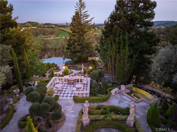a view of swimming pool patio and outdoor seating