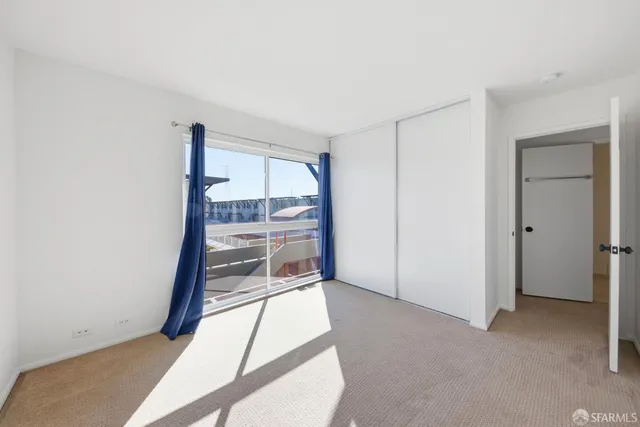 a view of balcony with a potted plant