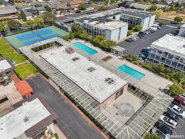 a view of swimming pool from a balcony