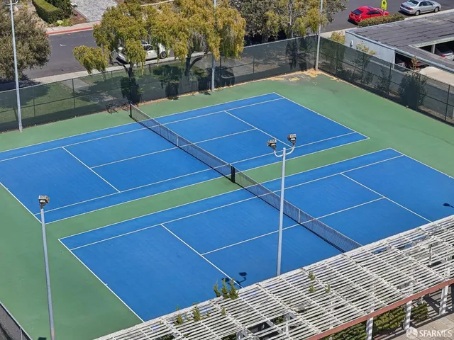 a view of a flower and flowers in front of a yard