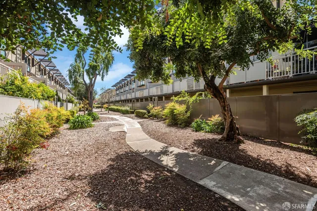 a view of a swimming pool with a lake view