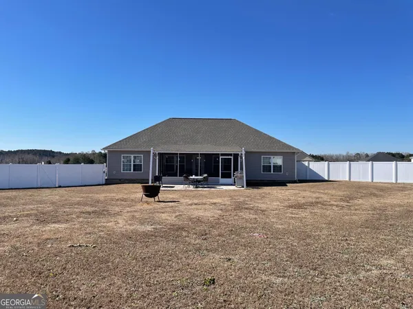 a house with yard in front of it