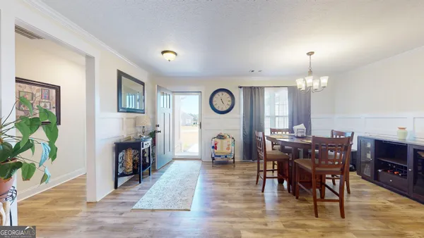 a view of a livingroom with furniture and a fireplace