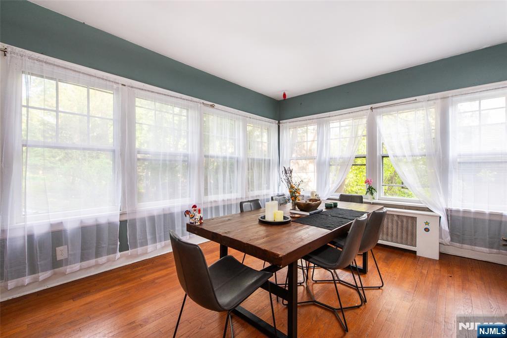 25 South Monroe Street Ridgewood, NJ 07450 - Photo 14 of 29 a view of a dining room with furniture and wooden floor