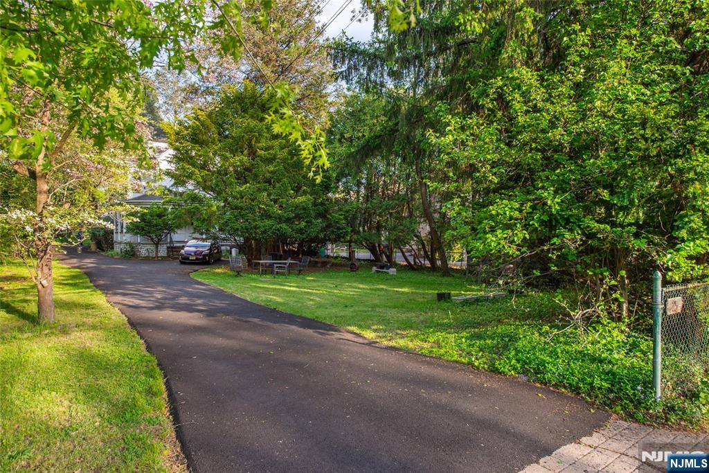 25 South Monroe Street Ridgewood, NJ 07450 - Photo 29 of 29 a view of a park with large trees