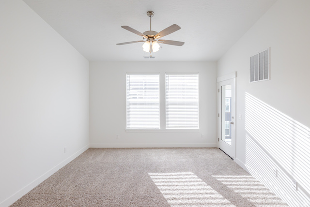 4662 Poplar Way, Unit Q301 Mapleton, UT 84664 - Photo 8 of 18 Unfurnished room featuring light carpet and ceiling fan