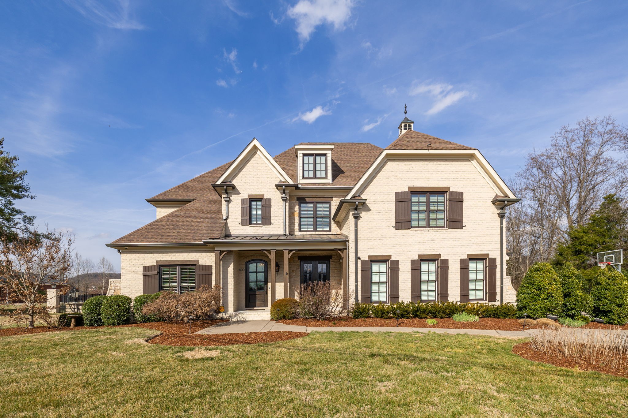 400 Ernest Rice Lane Franklin, TN 37069 - Photo 11 of 62 a front view of a house with a yard