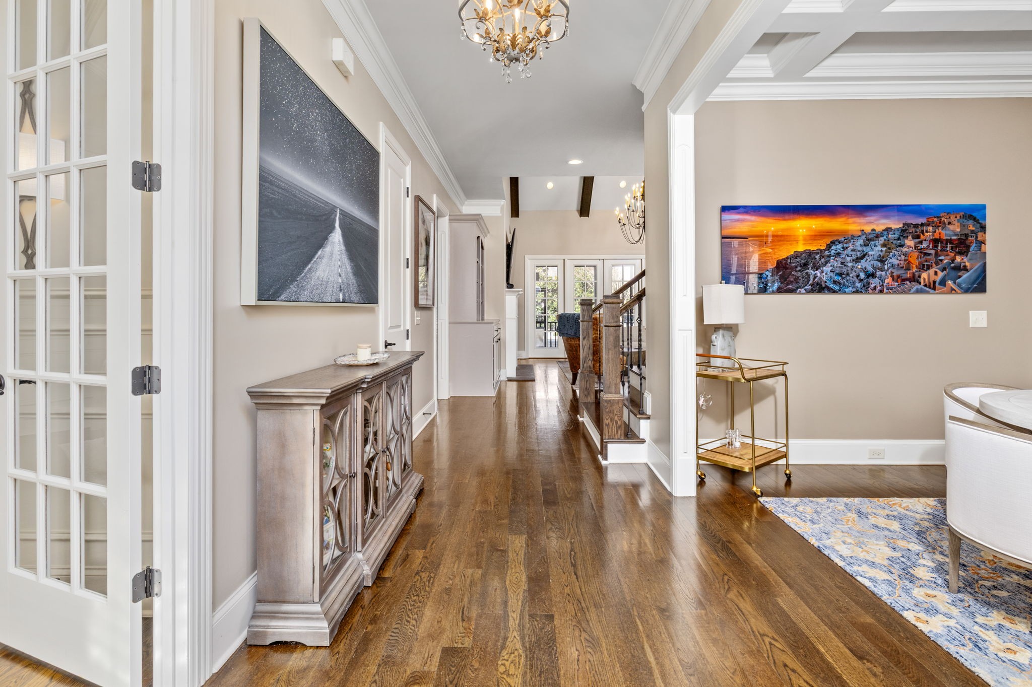 400 Ernest Rice Lane Franklin, TN 37069 - Photo 14 of 62 a view of a hallway with wooden floor and staircase