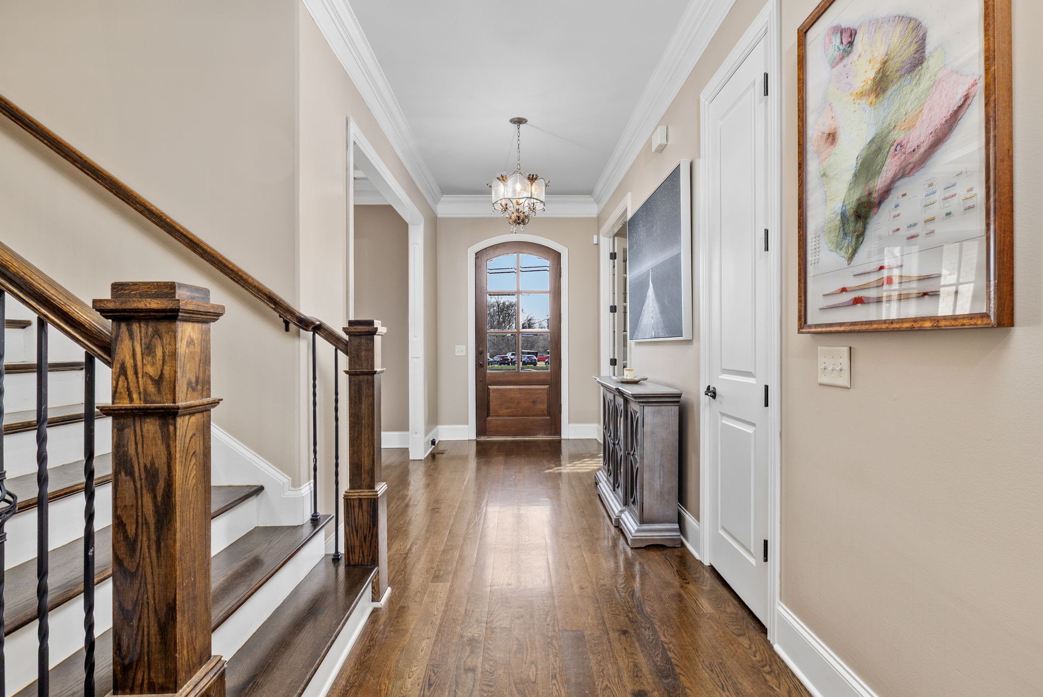 400 Ernest Rice Lane Franklin, TN 37069 - Photo 15 of 62 a view of a hallway view with wooden floor and staircase