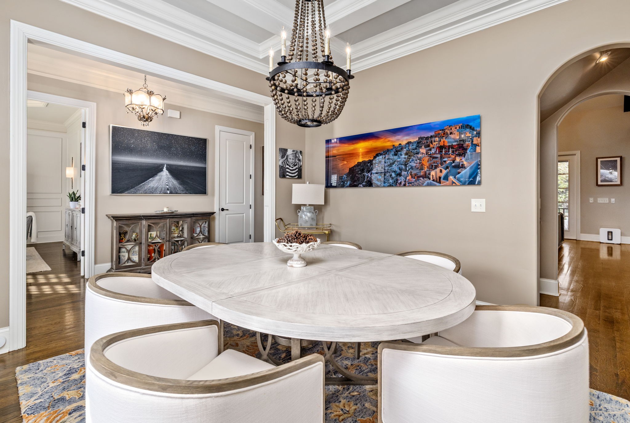 400 Ernest Rice Lane Franklin, TN 37069 - Photo 19 of 62 a dining room with furniture a chandelier and wooden floor