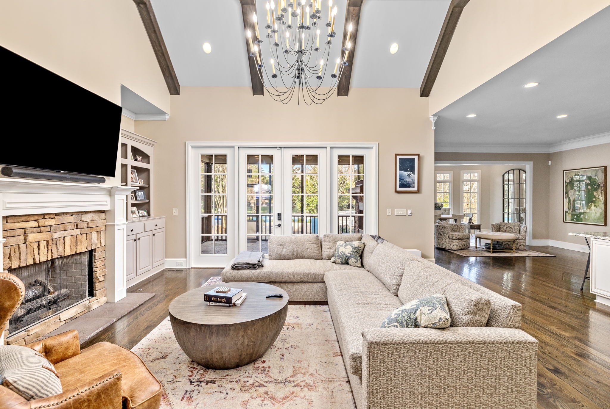 400 Ernest Rice Lane Franklin, TN 37069 - Photo 20 of 62 a living room with fireplace furniture and a flat screen tv