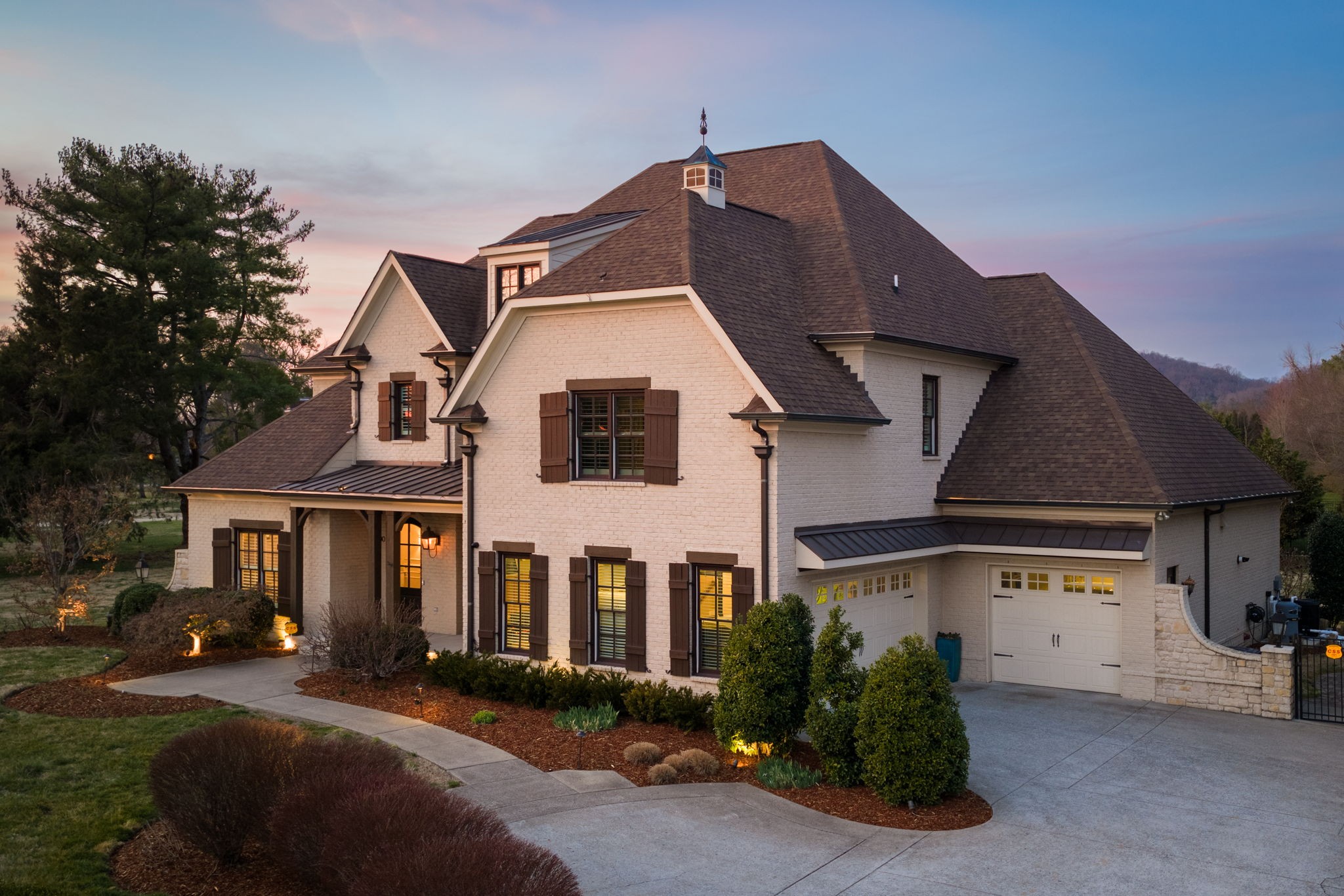 400 Ernest Rice Lane Franklin, TN 37069 - Photo 2 of 62 a front view of a house with a yard