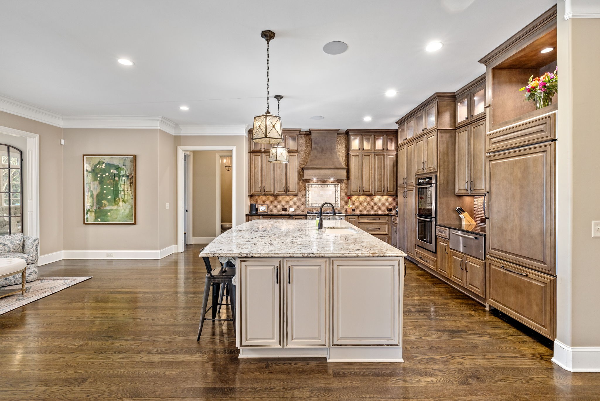 400 Ernest Rice Lane Franklin, TN 37069 - Photo 25 of 62 a kitchen with stainless steel appliances granite countertop a sink a stove and a refrigerator
