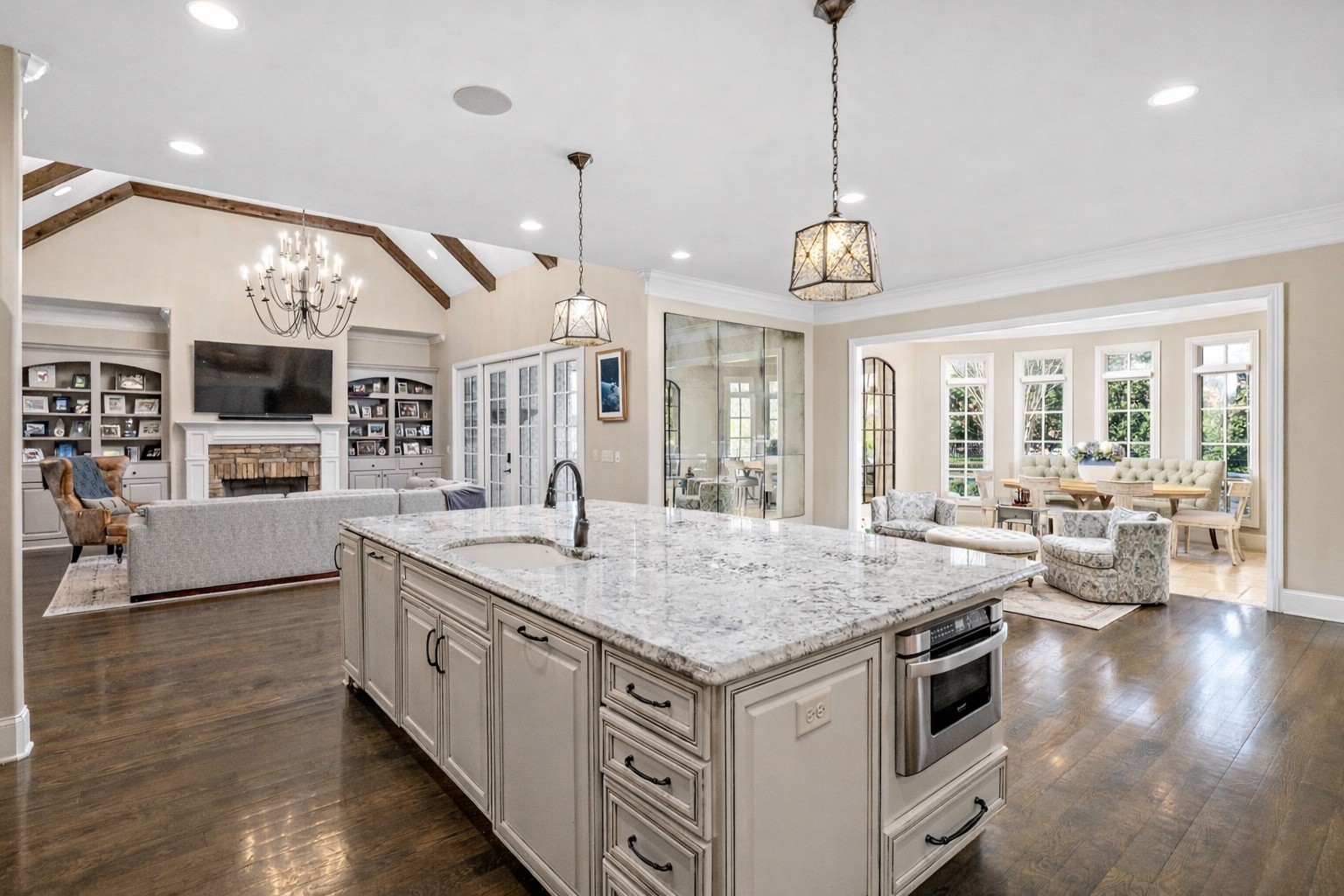 400 Ernest Rice Lane Franklin, TN 37069 - Photo 27 of 62 a hall with kitchen island granite countertop a stove and a view of living room