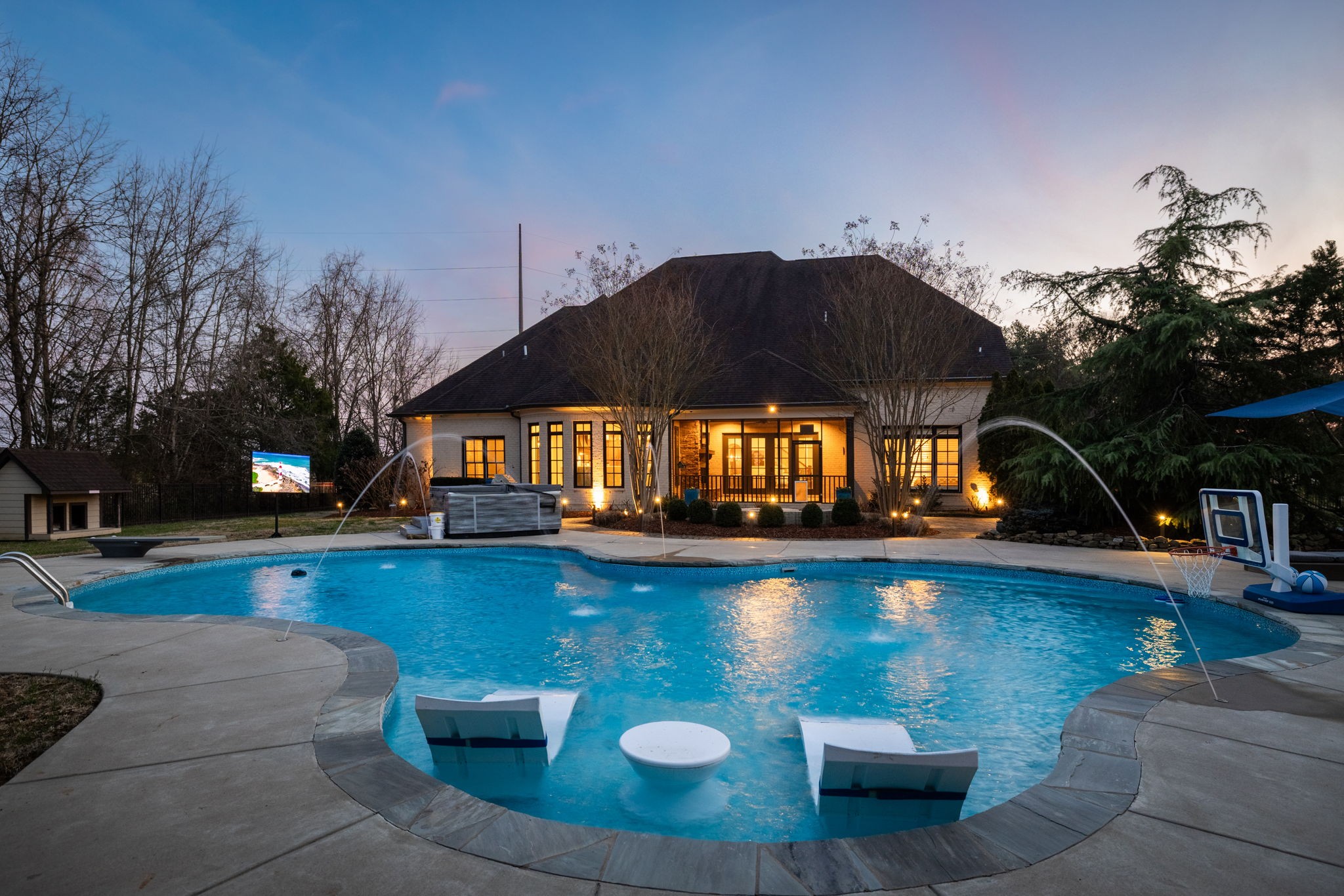 400 Ernest Rice Lane Franklin, TN 37069 - Photo 3 of 62 a view of a swimming pool and lounge chair