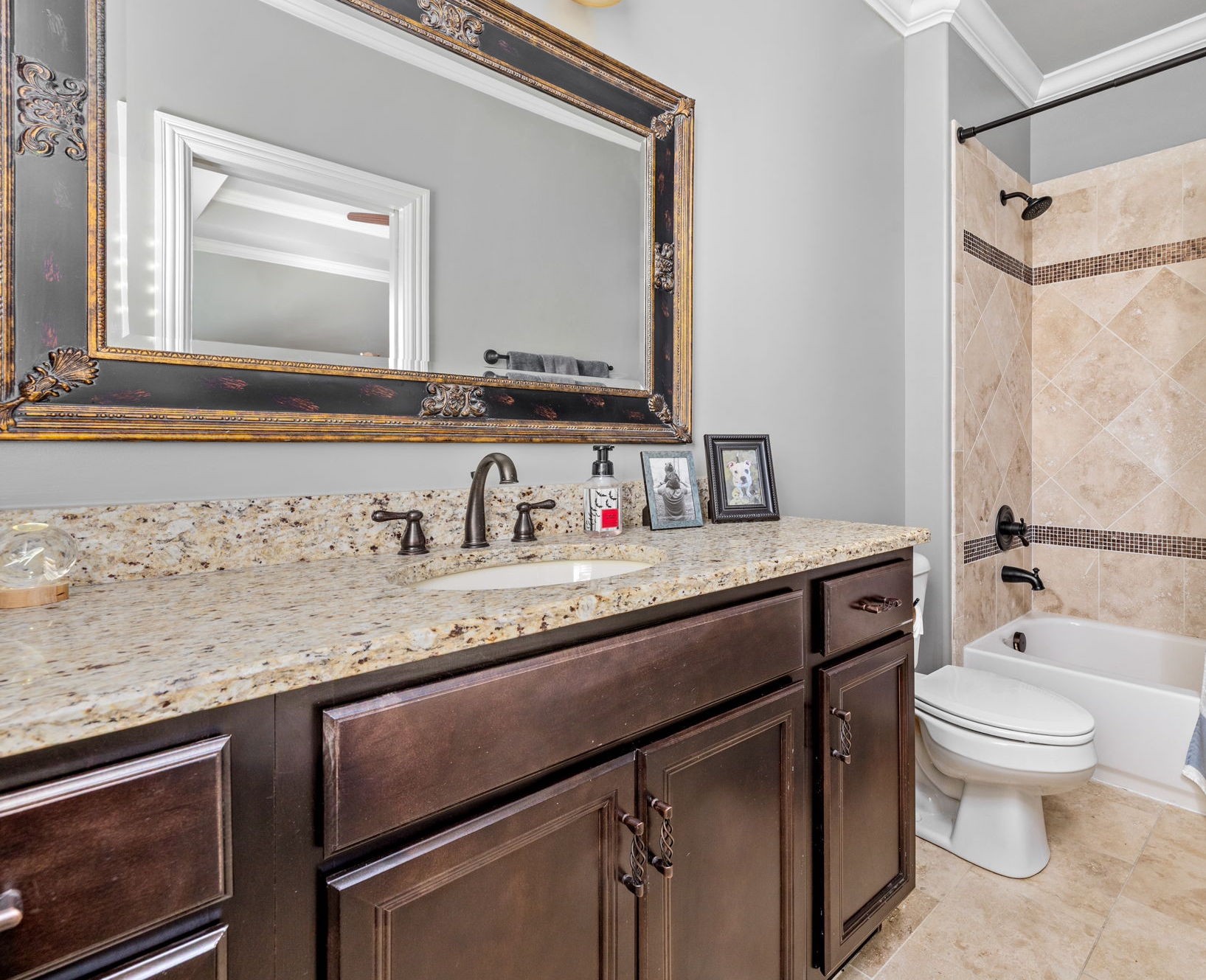 400 Ernest Rice Lane Franklin, TN 37069 - Photo 50 of 62 a bathroom with a granite countertop sink a mirror and a toilet