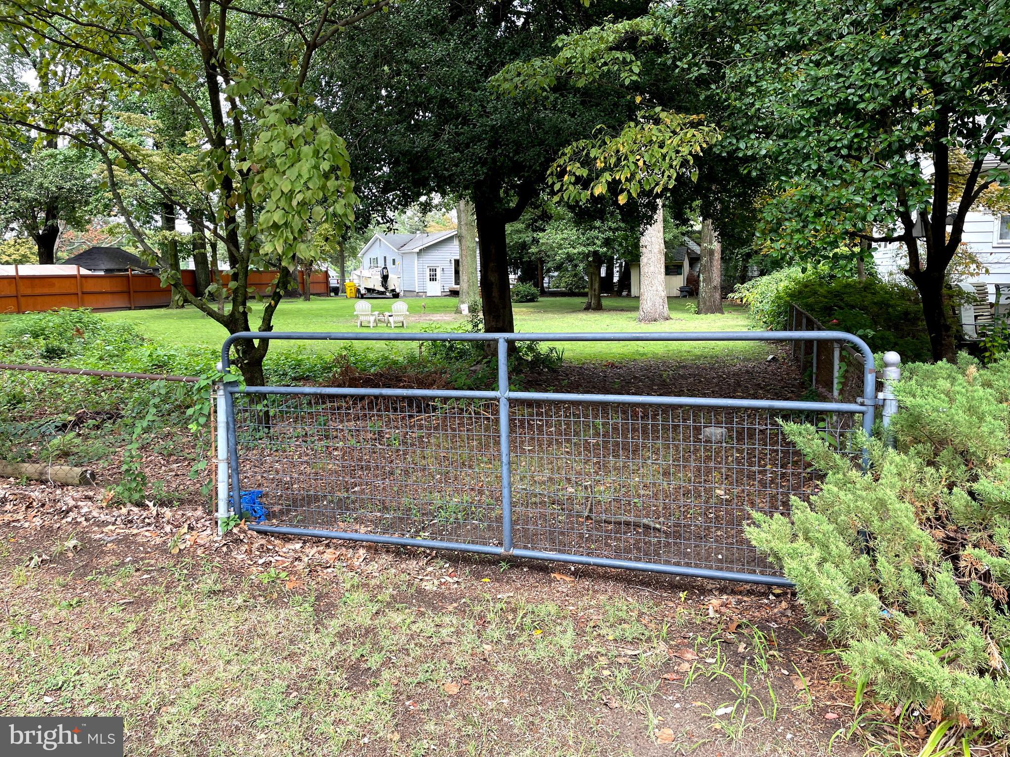 1669 Twickenham Road Pasadena, MD 21122 - Photo 15 of 15 private gate for yard access off of Grandview Rd