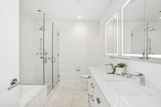 a bathroom with a sink and a shower