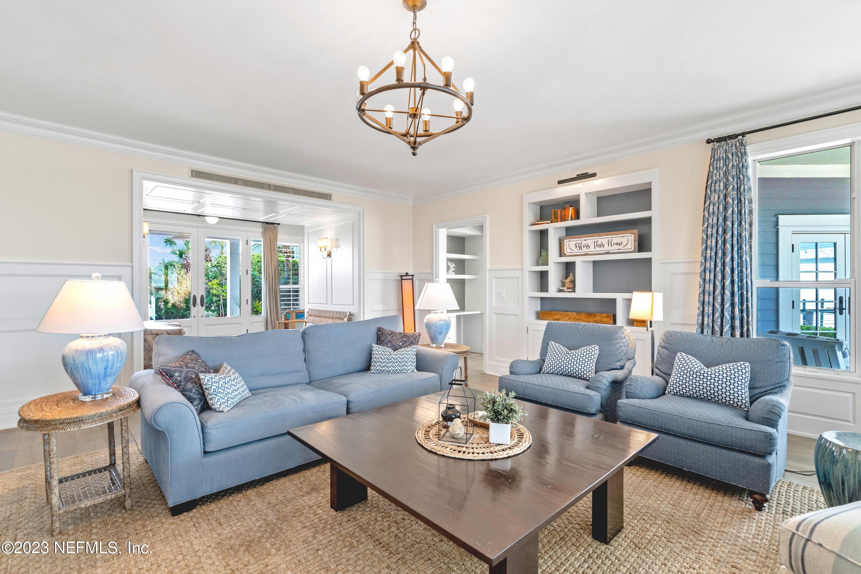 500 North Point Road St. Augustine, FL 32084 - Photo 13 of 102 a living room with furniture kitchen view and a large window