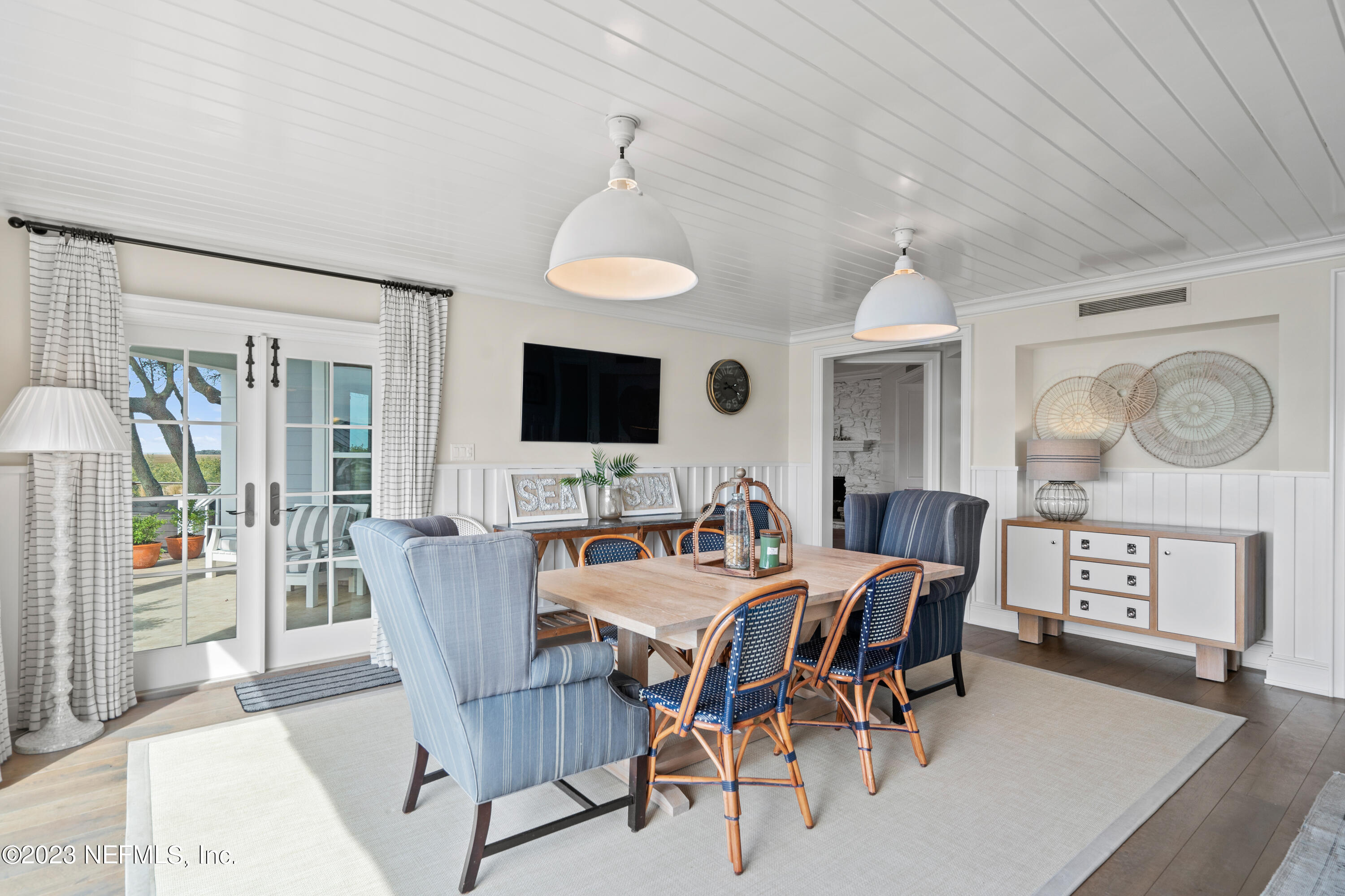 500 North Point Road St. Augustine, FL 32084 - Photo 16 of 102 a view of a dining room with furniture window and wooden floor