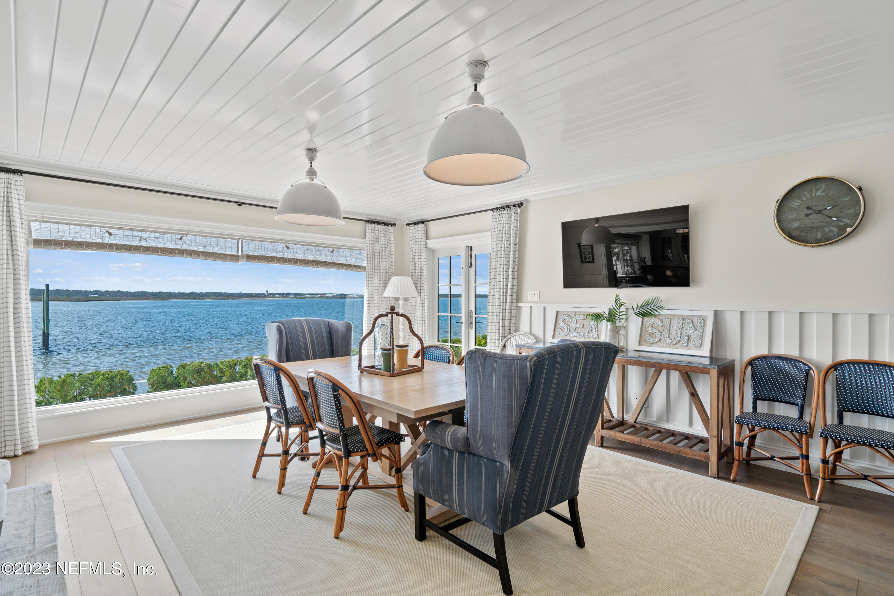 500 North Point Road St. Augustine, FL 32084 - Photo 17 of 102 a view of a dining room with furniture window and wooden floor