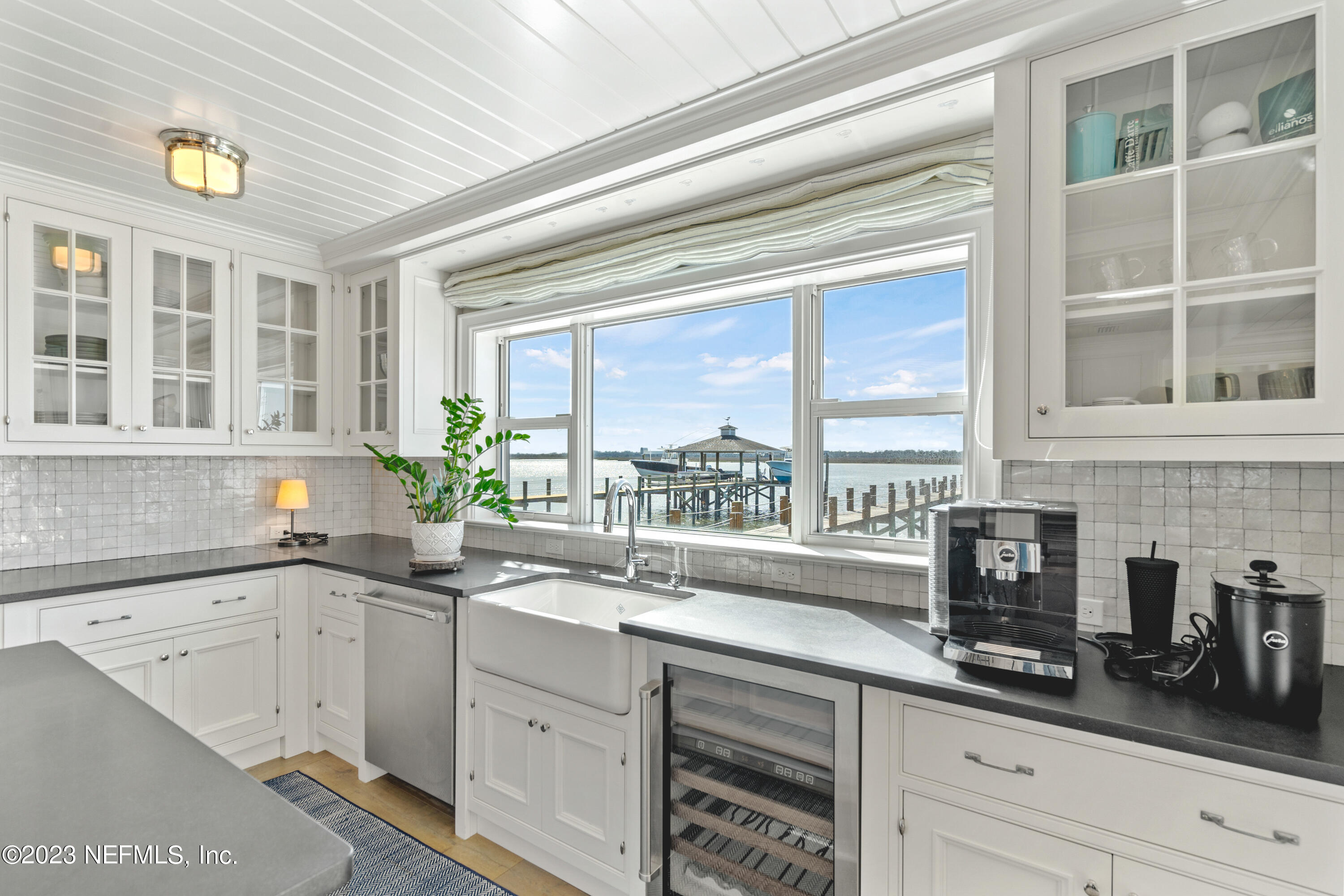 500 North Point Road St. Augustine, FL 32084 - Photo 21 of 102 a kitchen with a sink and large window