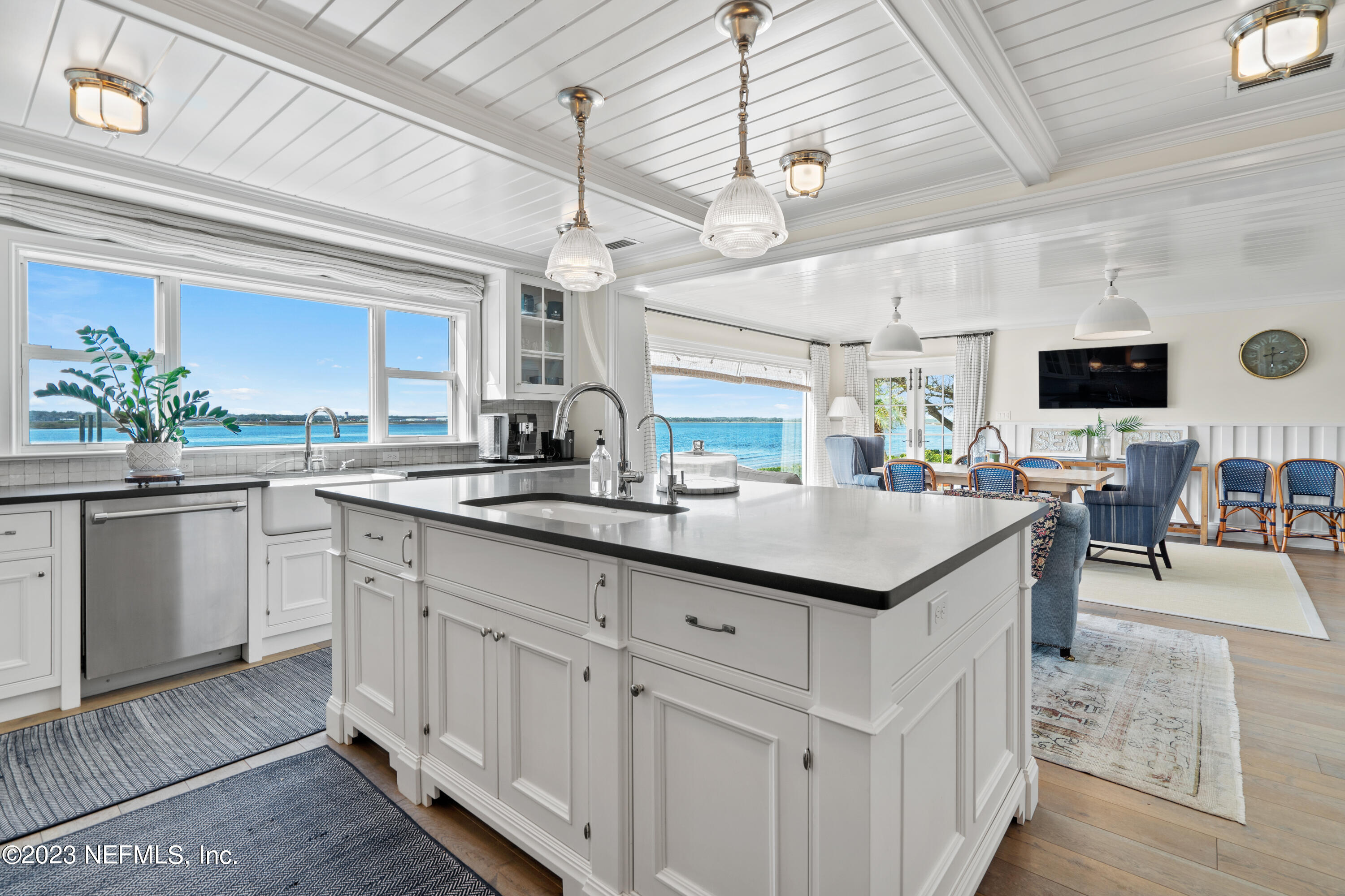 500 North Point Road St. Augustine, FL 32084 - Photo 24 of 102 a kitchen with white cabinets and sink