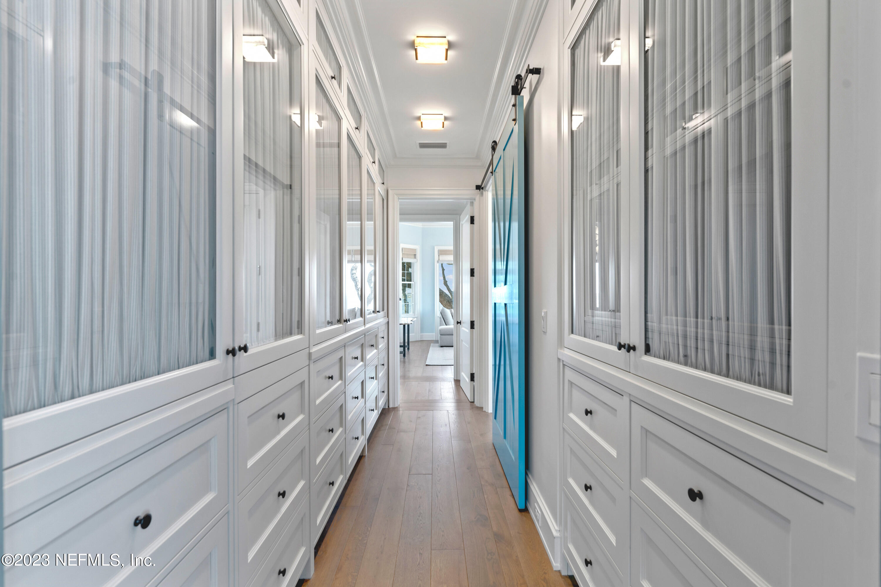 500 North Point Road St. Augustine, FL 32084 - Photo 31 of 102 a bathroom with a double vanity sink and mirror with shower