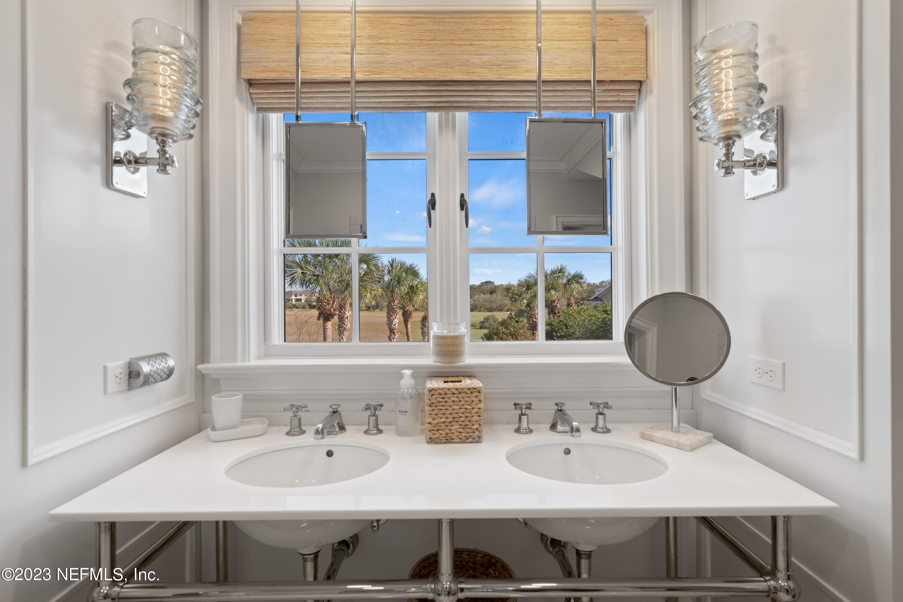 500 North Point Road St. Augustine, FL 32084 - Photo 47 of 102 a bathroom with a sink and a mirror