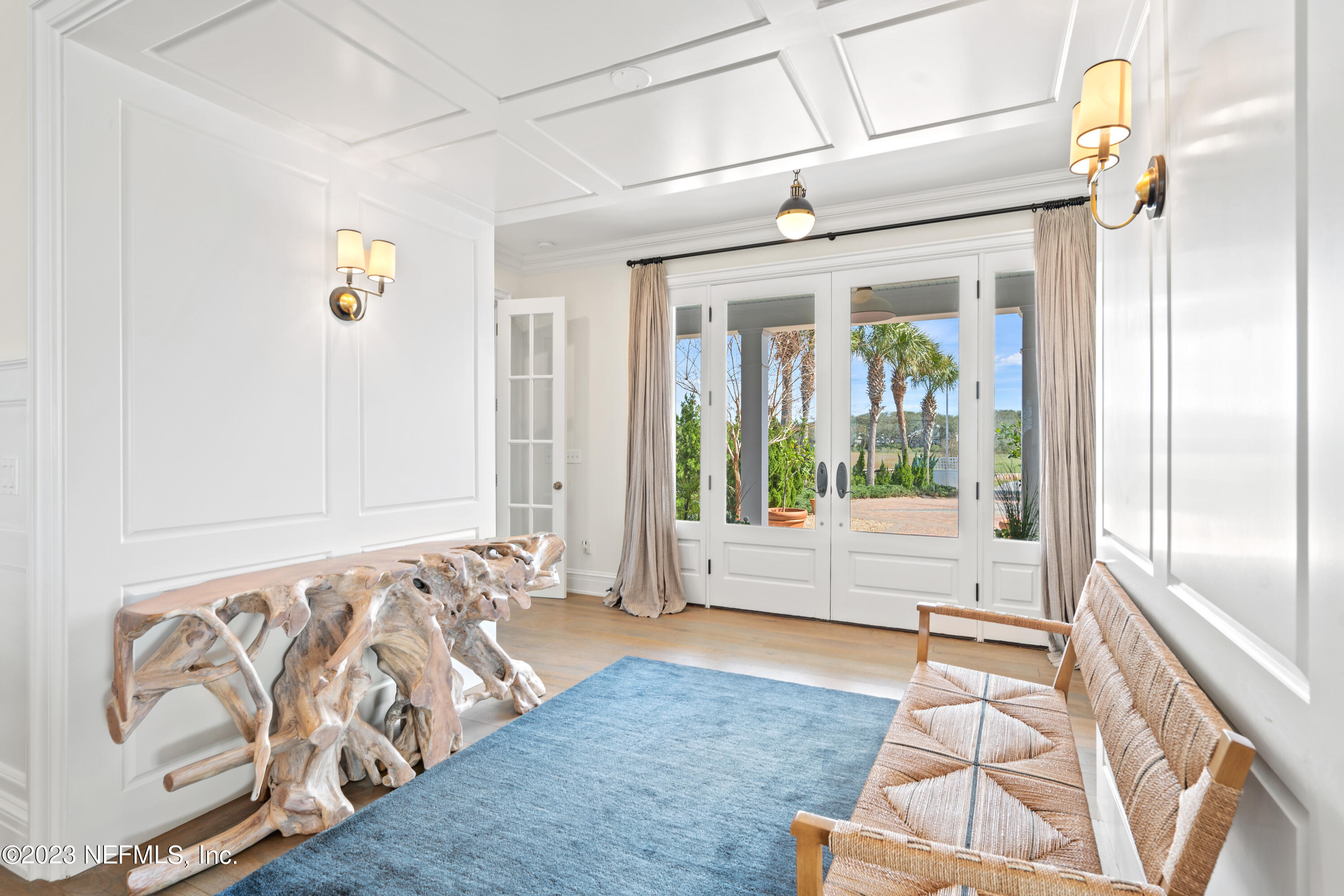 500 North Point Road St. Augustine, FL 32084 - Photo 6 of 102 a view of an entryway with wooden floor and windows