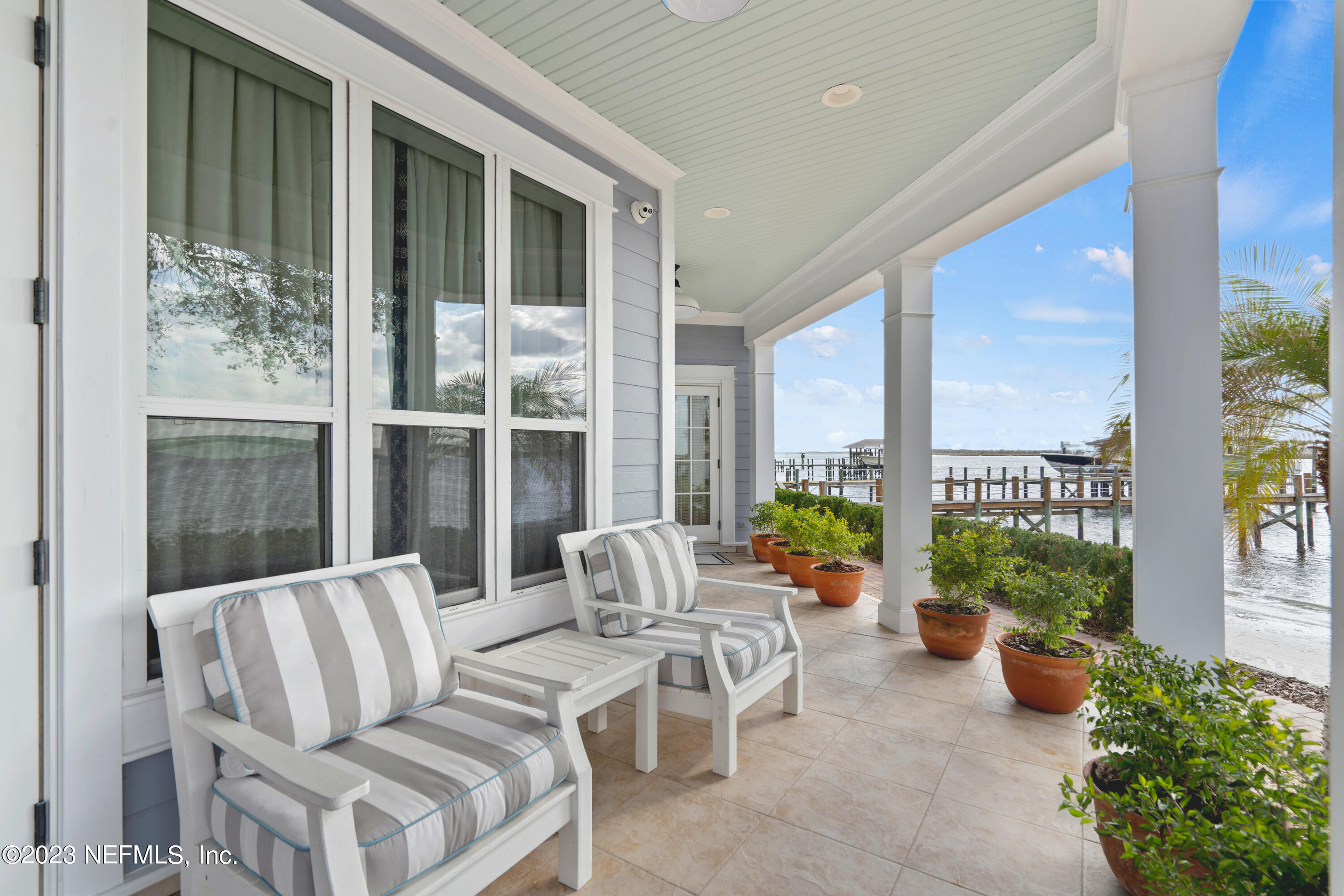 500 North Point Road St. Augustine, FL 32084 - Photo 70 of 102 a living room with furniture and a large window