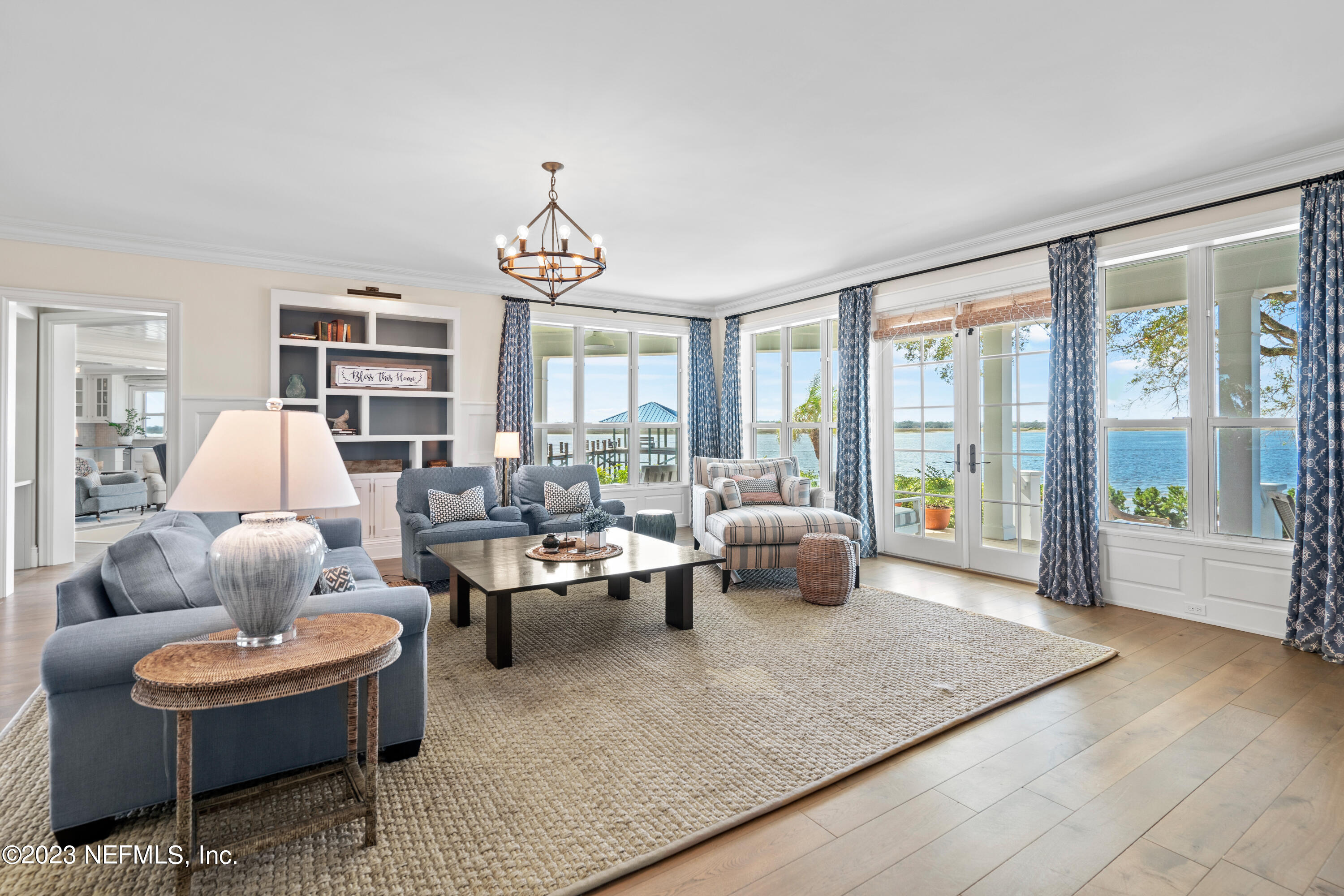 500 North Point Road St. Augustine, FL 32084 - Photo 10 of 102 a living room with furniture a table and a large window