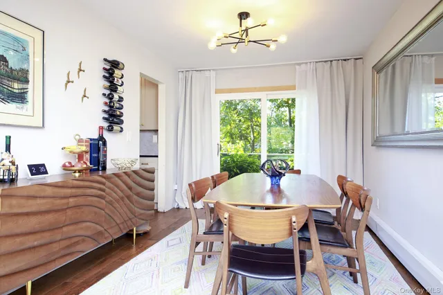 a bedroom with a bed and a table