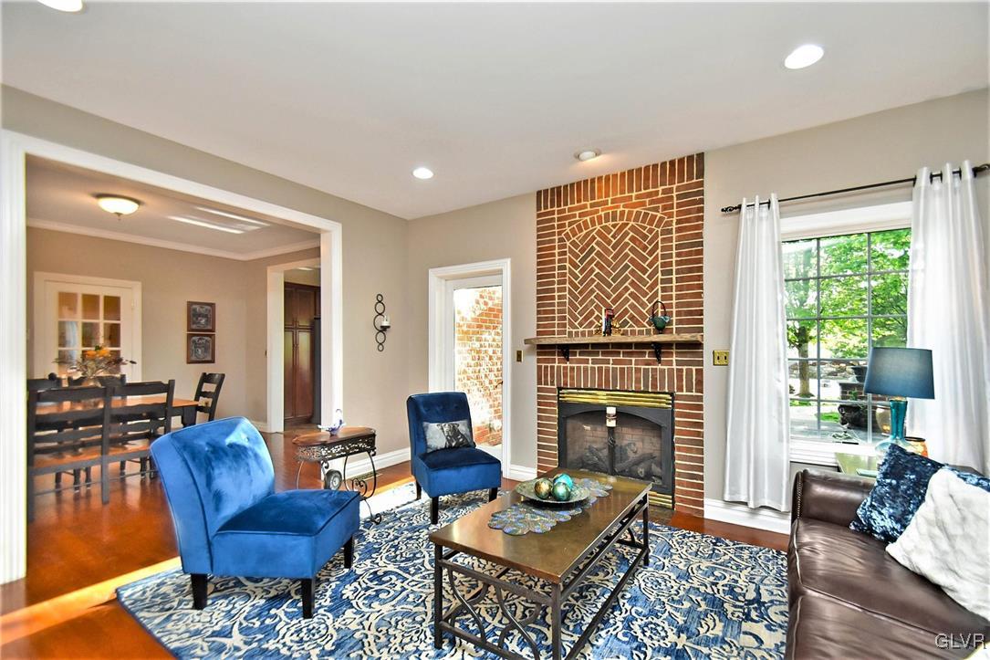 215 Klein Road Bath, PA 18014 - Photo 15 of 44 a living room with fireplace furniture and a fireplace