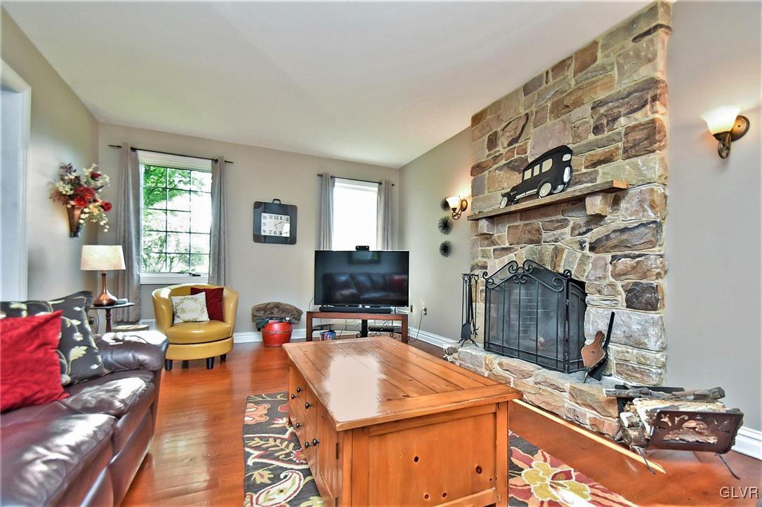 215 Klein Road Bath, PA 18014 - Photo 18 of 44 a living room with furniture and a flat screen tv
