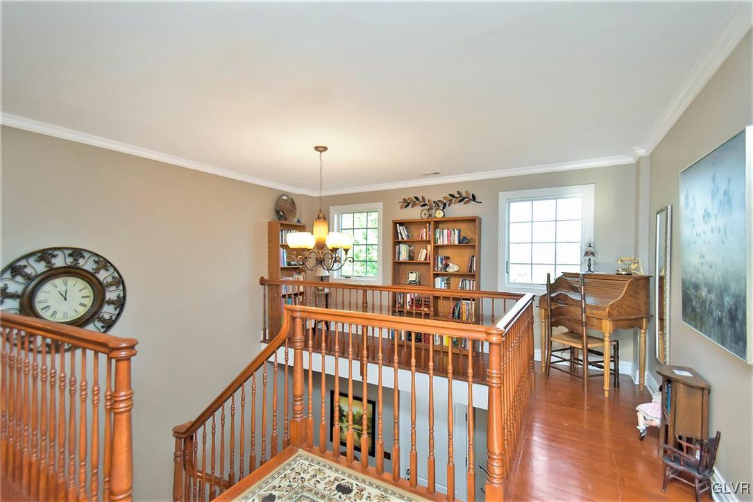 215 Klein Road Bath, PA 18014 - Photo 22 of 44 a view of a hallway with wooden floor and stairs