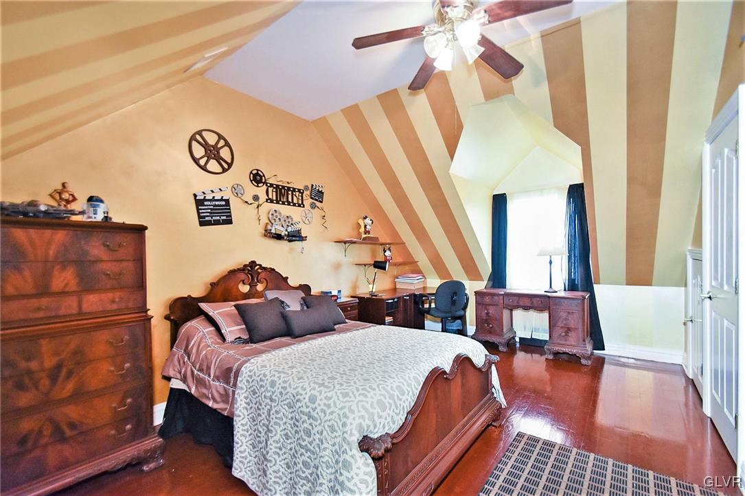 215 Klein Road Bath, PA 18014 - Photo 34 of 44 a bed room with a bed and a book shelf