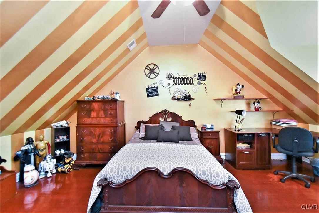 215 Klein Road Bath, PA 18014 - Photo 35 of 44 a bedroom with a bed and wooden floor