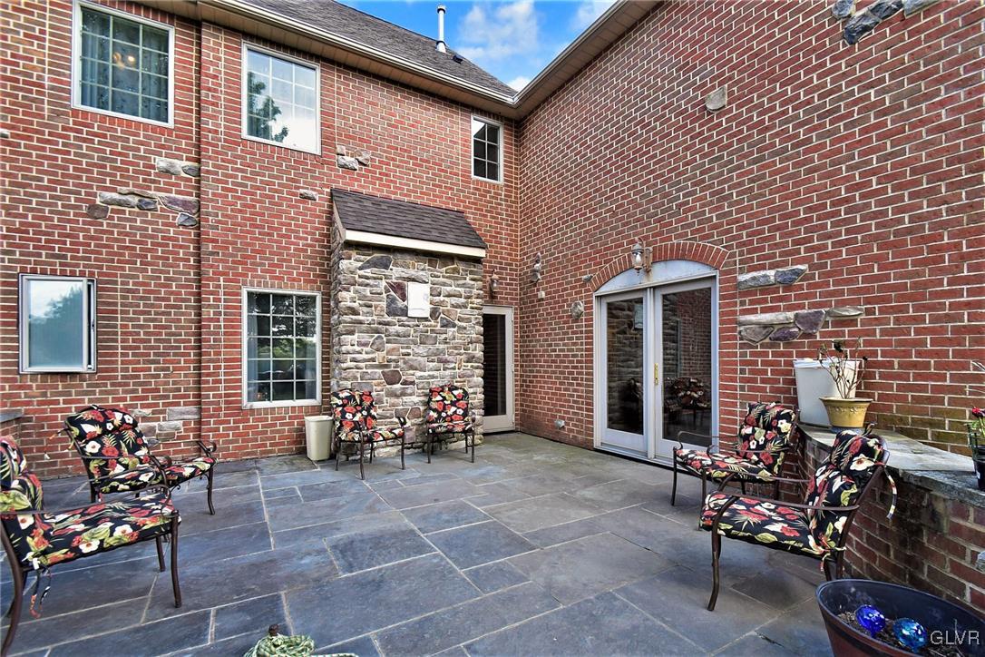 215 Klein Road Bath, PA 18014 - Photo 38 of 44 a building outdoor space with patio furniture and potted plants