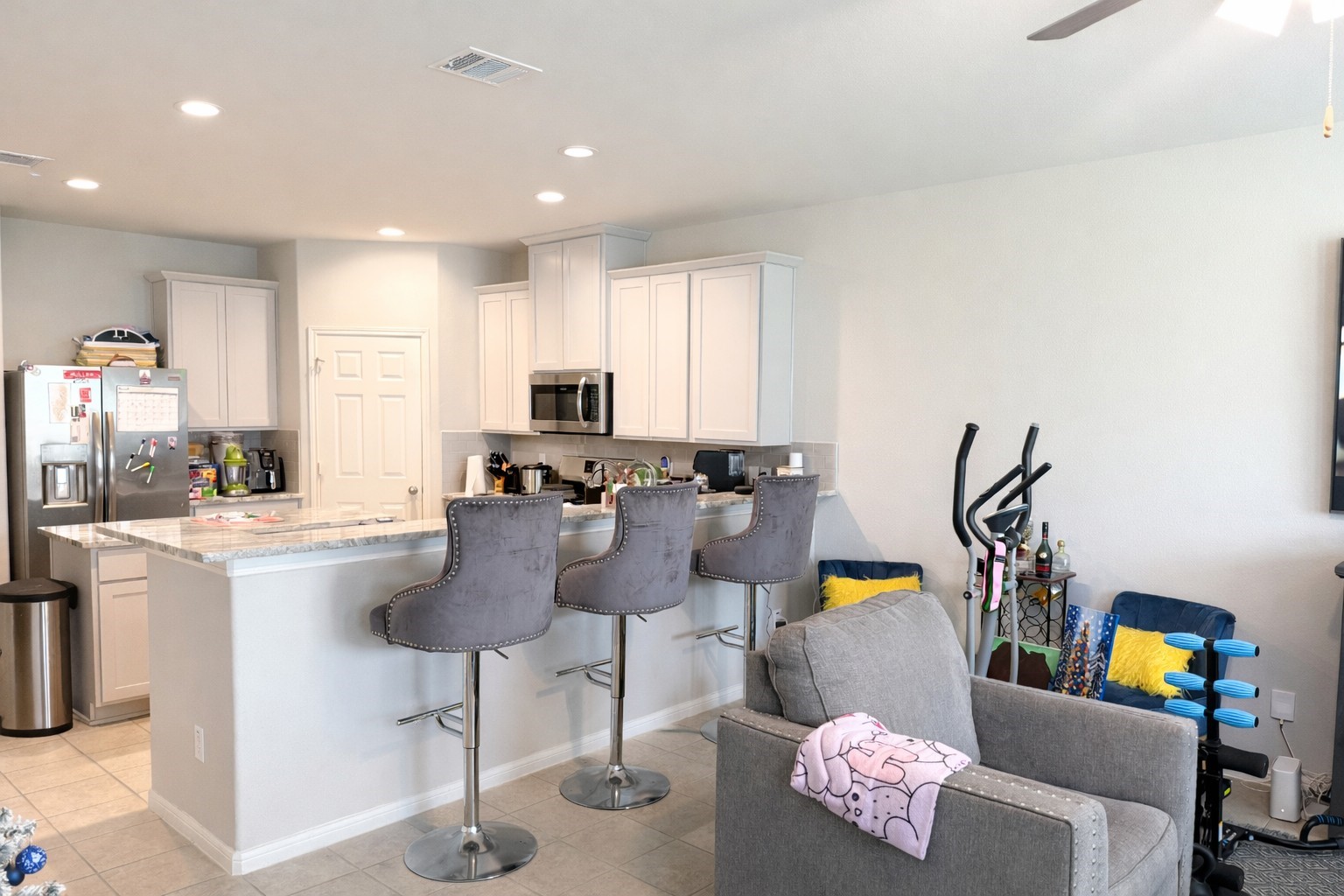 26016 Babe Ruth Drive Splendora, TX 77372 - Photo 4 of 11 a living room with furniture and a dining table