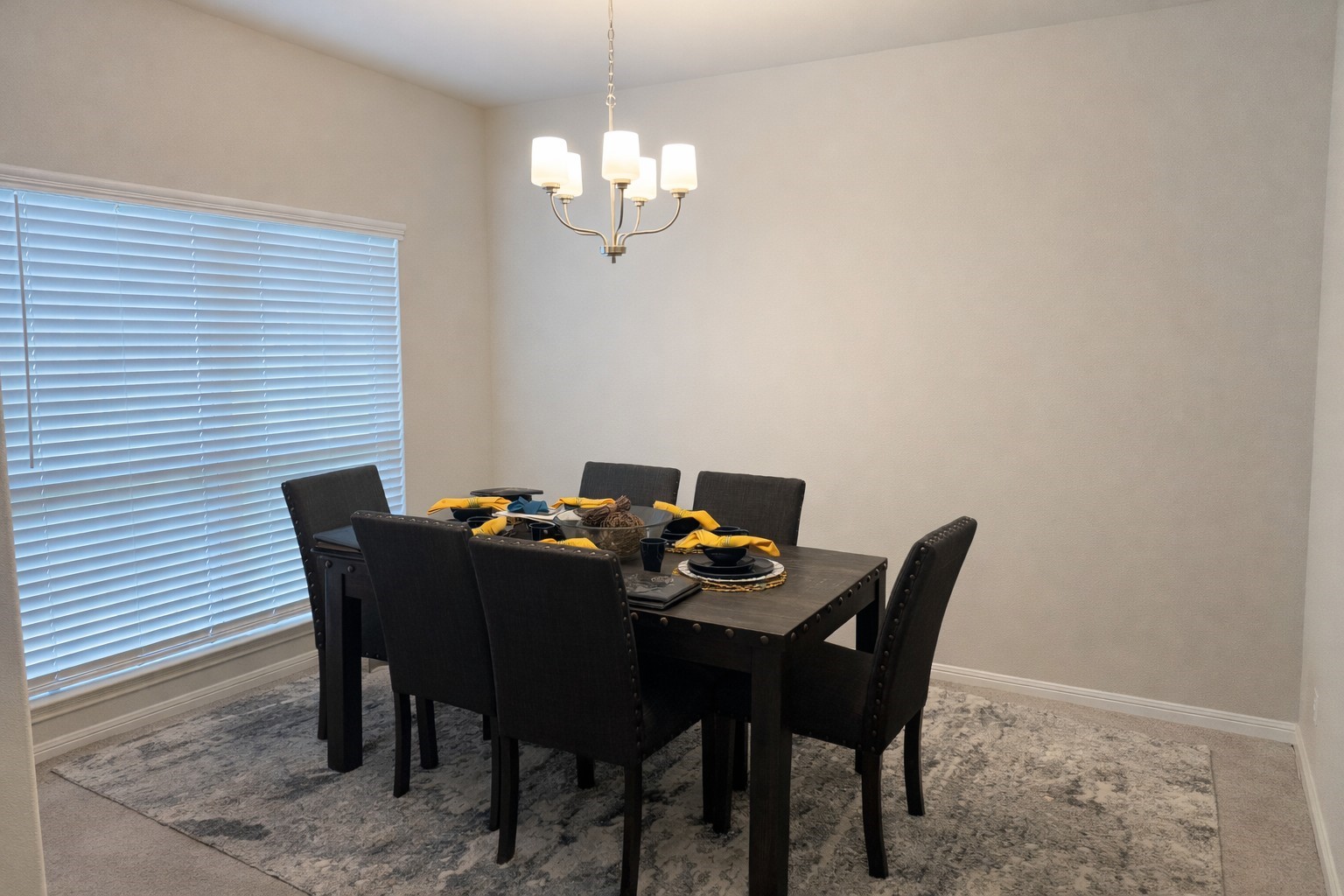 26016 Babe Ruth Drive Splendora, TX 77372 - Photo 7 of 11 a dining room with a table and chairs