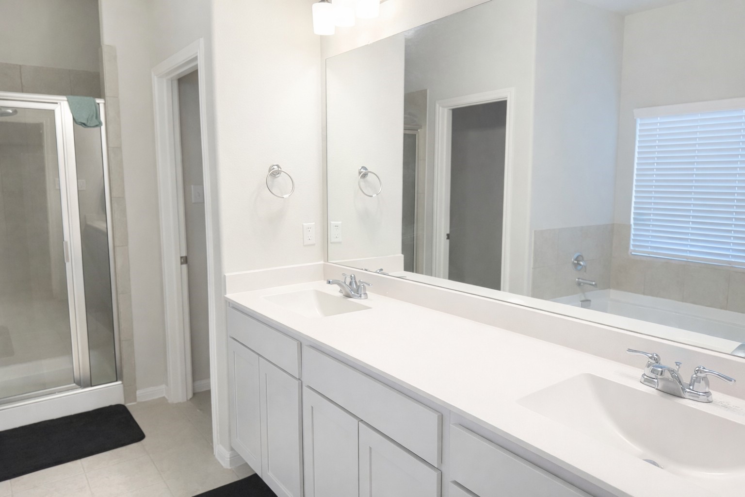26016 Babe Ruth Drive Splendora, TX 77372 - Photo 9 of 11 a bathroom with a sink and a mirror