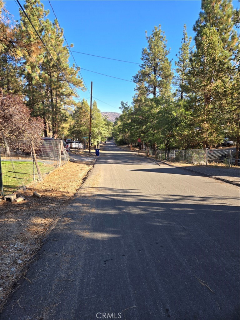 312 Riverside Avenue Big Bear City, CA 92386 - Photo 21 of 22 a view of a swimming pool with an outdoor space and seating area
