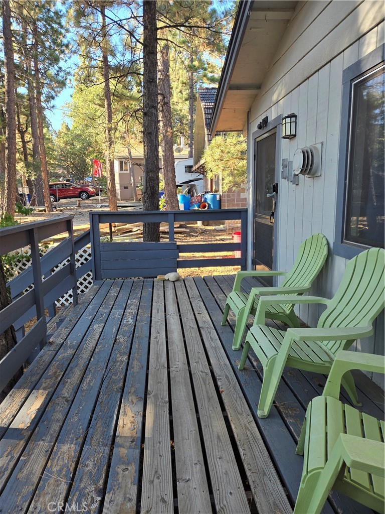 312 Riverside Avenue Big Bear City, CA 92386 - Photo 4 of 22 a view of balcony with chairs