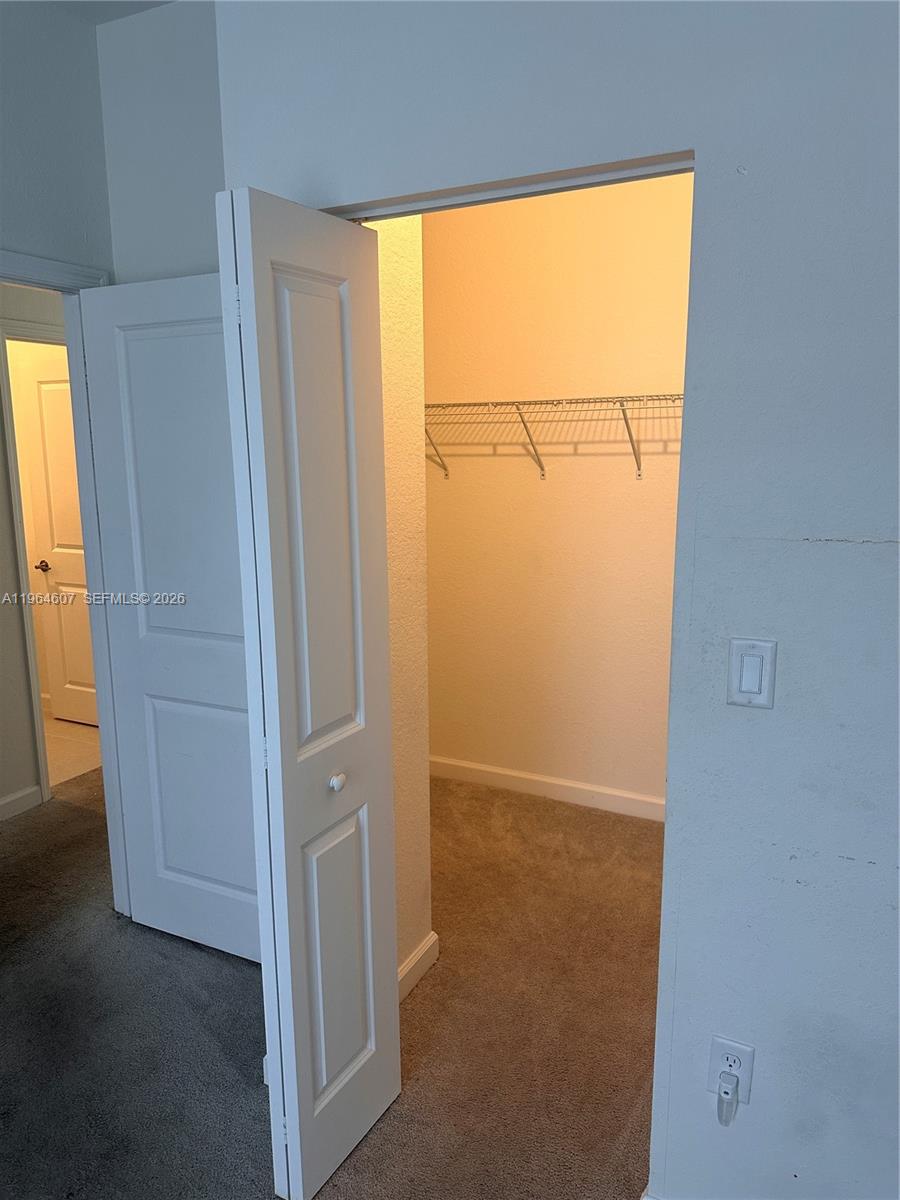 623 Southeast 13th St Circle Homestead, FL 33034 - Photo 18 of 28 an empty room with a window